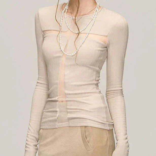 A stylish Gothic Cross Gauze T-Shirt featuring a subtle yet bold cross design and a see-through gauze patchwork for a captivating, edgy look.