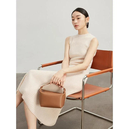 Elegant wool blend sleeveless dress in beige with a flattering fit-and-flare silhouette, perfect for autumn and winter wear