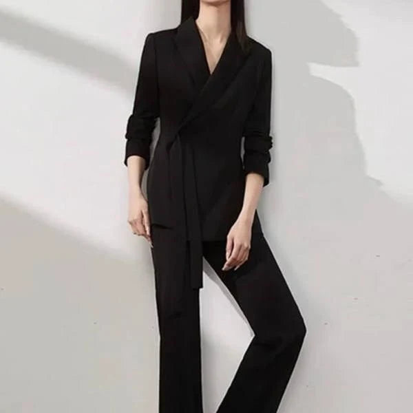 Elegant vintage-inspired two-piece office suit with tailored blazer and high-waisted trousers in premium polyester fabric