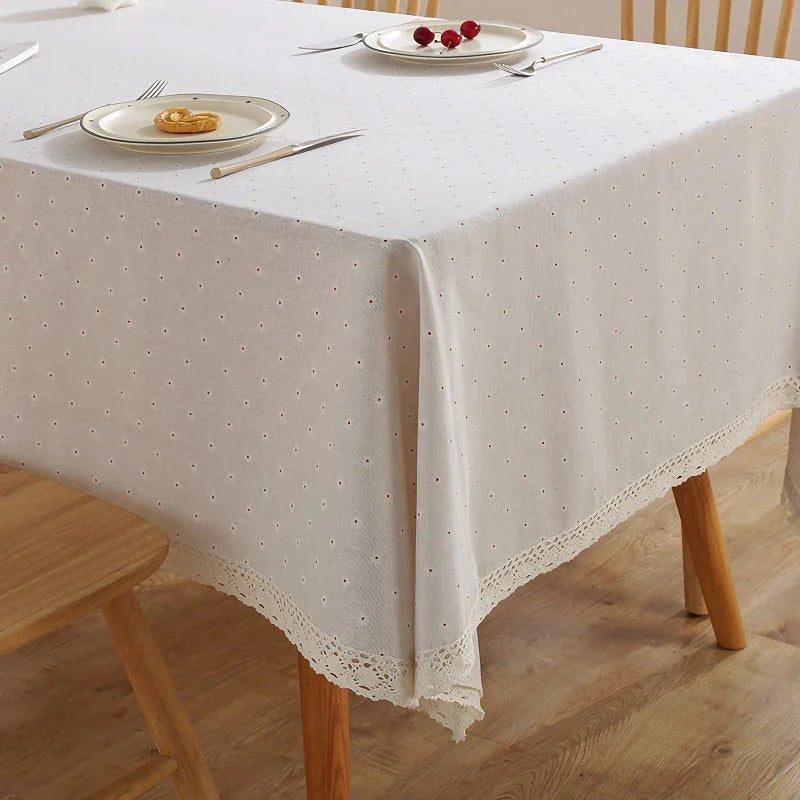 Elegant polyester linen tablecloth with delicate lace edging, available in various sizes for a sophisticated dining experience.