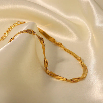 18k gold-plated stainless steel snake chain bracelet with a minimalist and timeless design