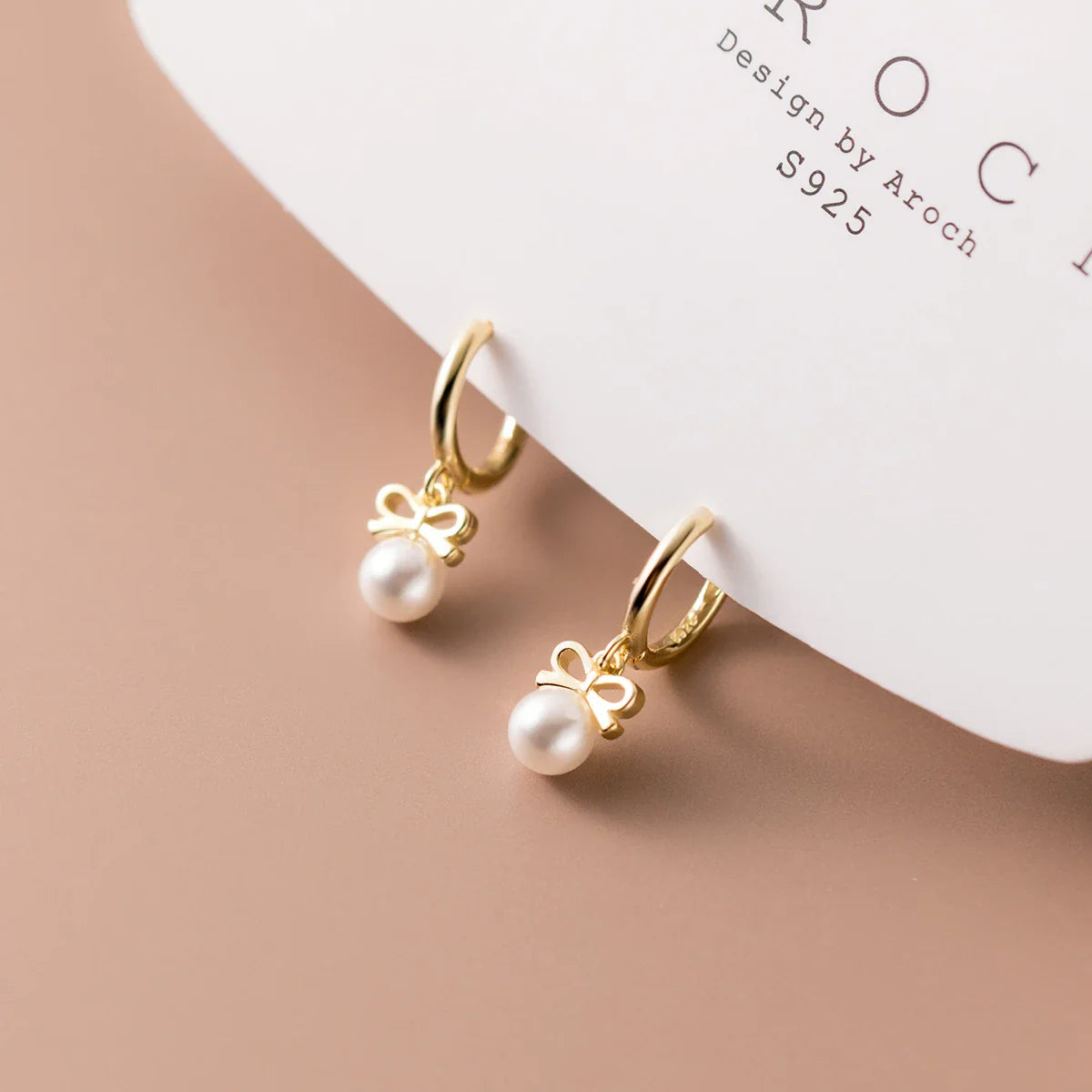 Elegant sterling silver earrings with a delicate butterfly design, inspired by Japanese and Korean fashion
