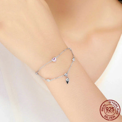 Elegant silver bracelet with a delicate sweetheart design, perfect for adding a touch of sophistication to any outfit.