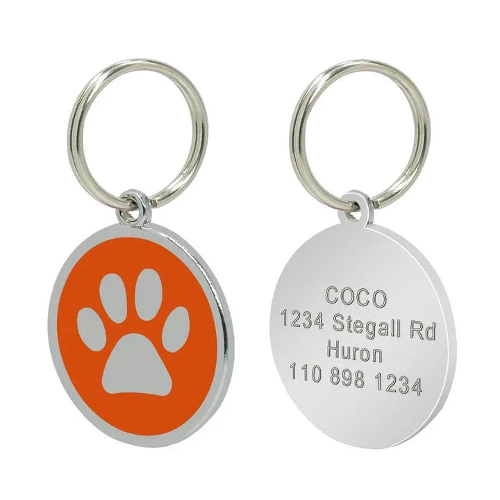 Customisable stainless steel pet ID tags in various colours, designed for identifying and protecting your beloved companion