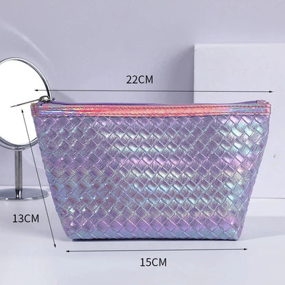 Large leather travel cosmetic bag with stylish paillette pattern, perfect for organising makeup and toiletries on the go