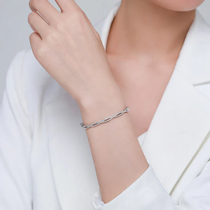 Silver bracelet with wave pattern, ideal for fashion-conscious women in the UK