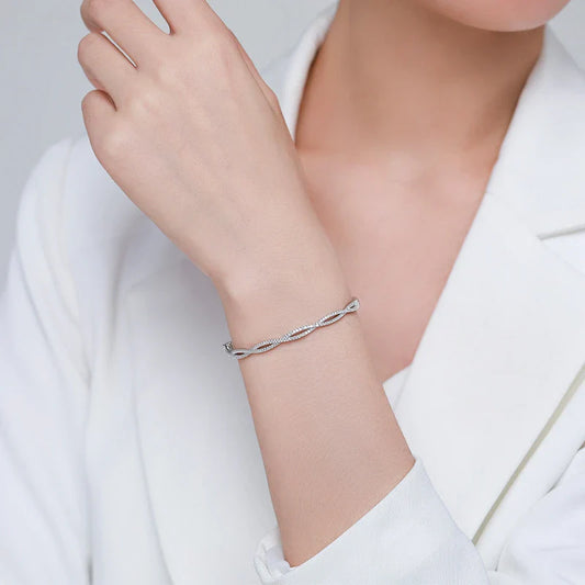Silver bracelet with wave pattern, ideal for fashion-conscious women in the UK