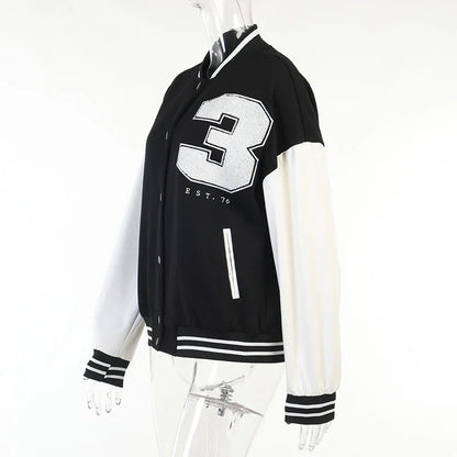 A classic British-style baseball jacket with contrast PU stitching, showcasing a sophisticated and versatile design for casual wear.