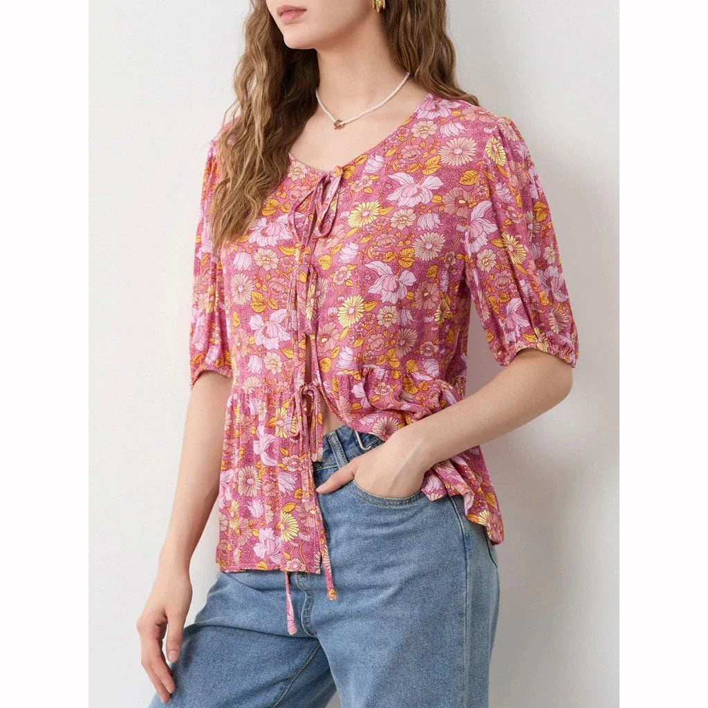 Elegant floral lace-up bow blouse with unique hollow-out details and a delicate floral print