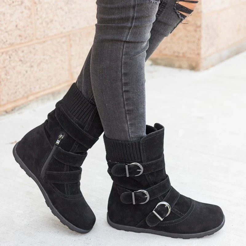Durable cotton boots with resilient rubber soles, stylish car-stitch detailing, and cushioned artificial hair insole for all-day comfort.