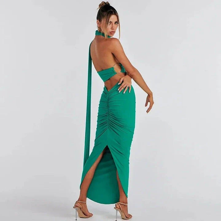 Elegant backless cocktail dress set with halter crop top and maxi skirt, perfect for summer events and occasions