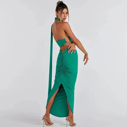 Elegant backless cocktail dress set with halter crop top and maxi skirt, perfect for summer events and occasions