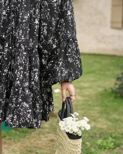 Elegant floral print dress with flared sleeves and flounced edges, perfect for middle-aged women who appreciate style and comfort.