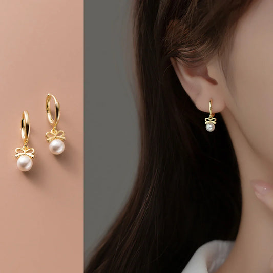 Elegant sterling silver earrings with a delicate butterfly design, inspired by Japanese and Korean fashion