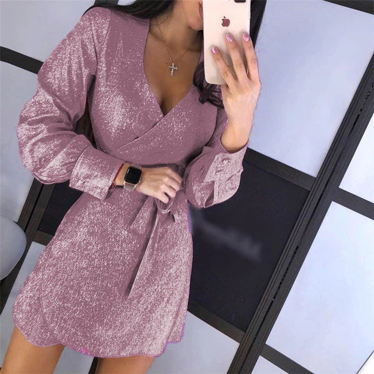 A glamorous midi dress with a lace overlay and sparkling silver sequin details, perfect for special occasions.