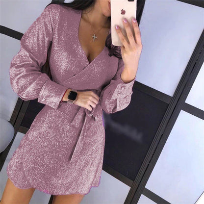 A glamorous midi dress with a lace overlay and sparkling silver sequin details, perfect for special occasions.