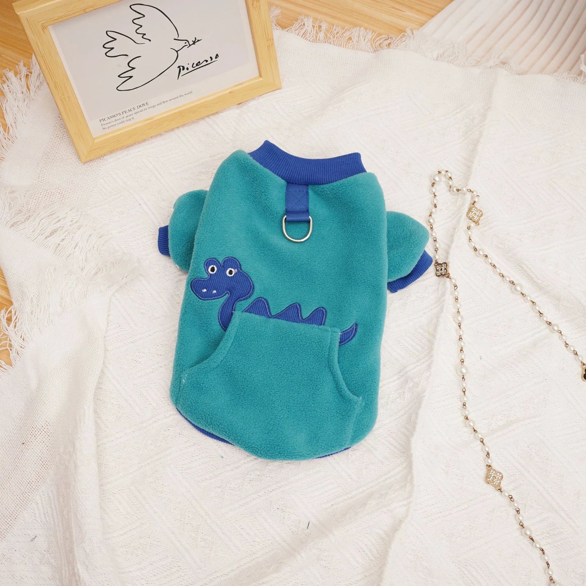 Plush and cosy pet clothing in various colours, designed for warmth and comfort