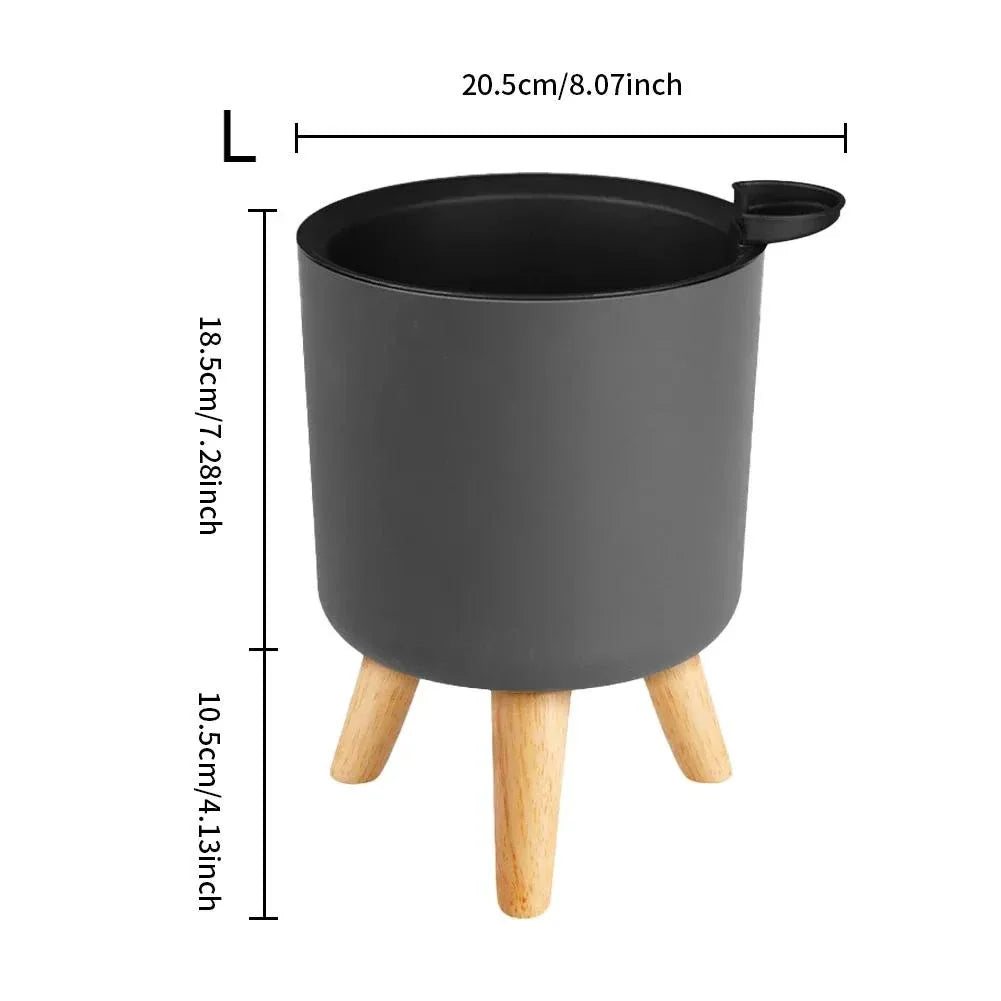 Modern self-watering planter with sleek wooden stand, available in small, medium, and large sizes