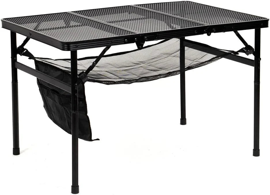 Adjustable portable folding camping table with aluminium frame, black in colour, set up outdoors