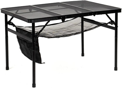 Adjustable portable folding camping table with aluminium frame, black in colour, set up outdoors