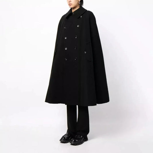 Elegant and warm British-style woollen shawl overcoat with a distinctive cape-style design, double-breasted closure, and full-length sleeves for superior comfort and style.