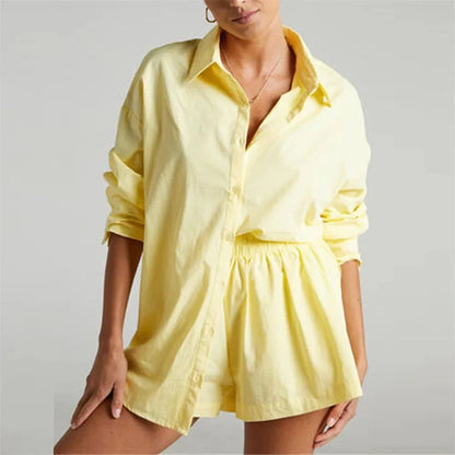 Chic high-waist cotton linen shirt and shorts set in pink, featuring a turn-down collar, long sleeves, and a relaxed, flattering fit for the modern British woman.