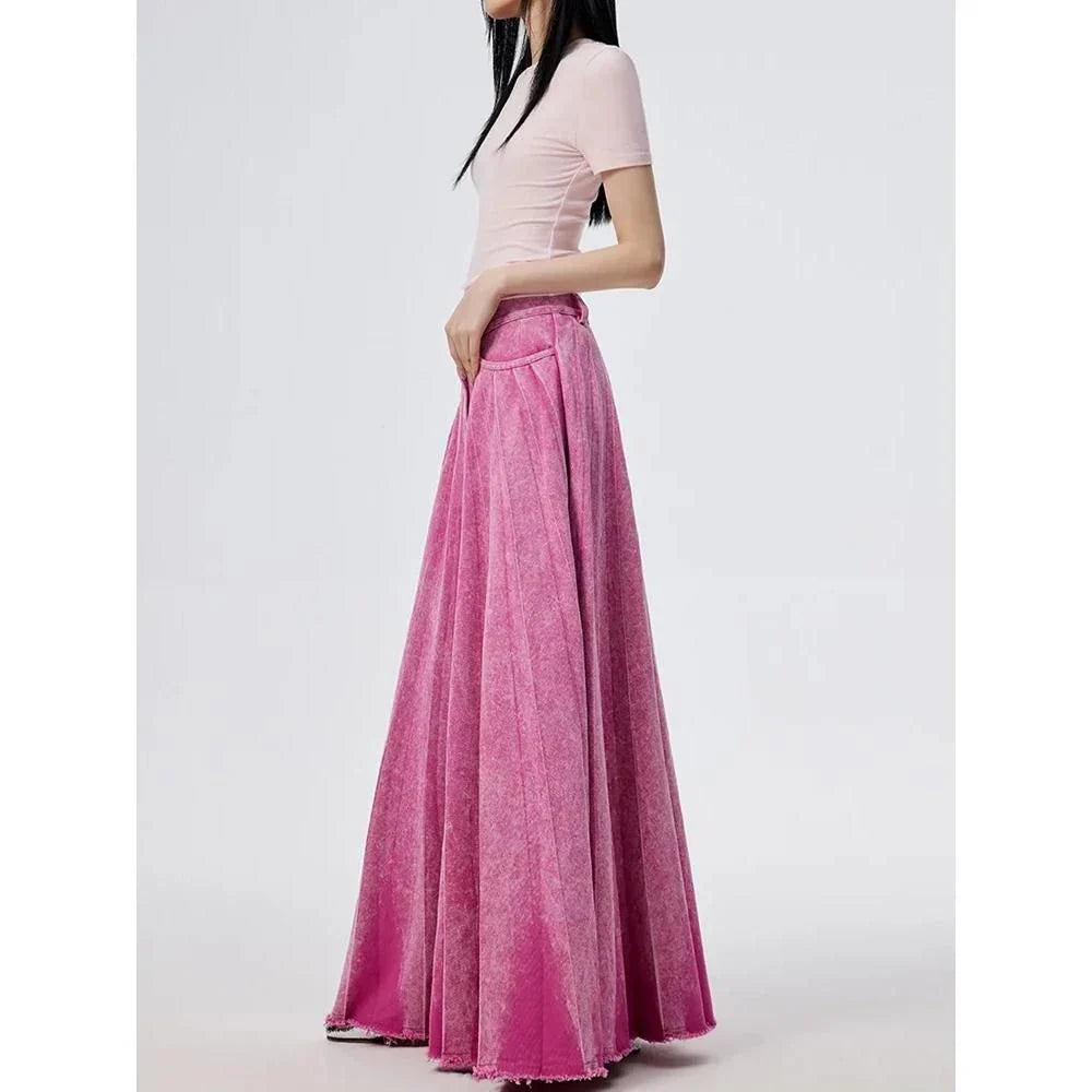 Elegant high-waist A-line denim skirt in a vibrant rose pink colour, perfect for any occasion.