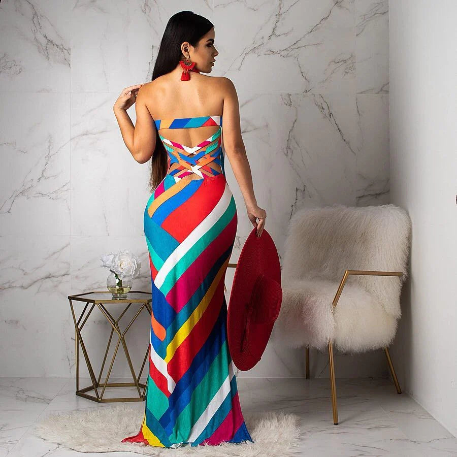 Elegant printed halter dress in vibrant colours, designed with a flattering silhouette and premium polyester fibre for exceptional quality.