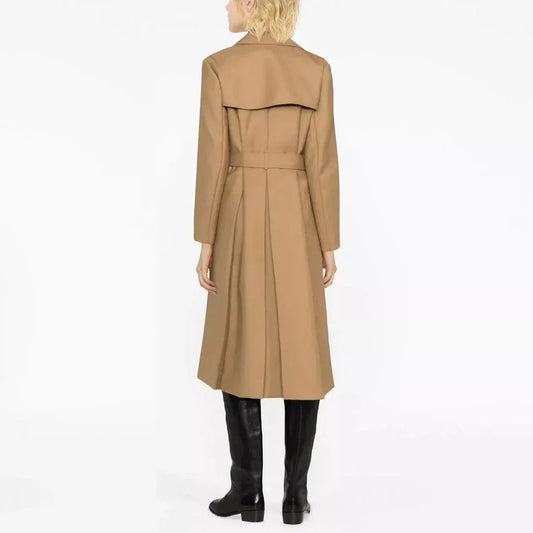 Elegant double-breasted women's trench coat in beige, featuring a classic collar, wide-waisted design, and practical pockets for a sophisticated and timeless look.