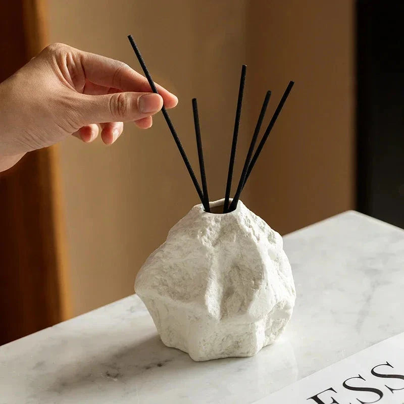 Elegant Nordic-style ceramic aromatherapy diffuser bottle with a modern, rock-inspired design