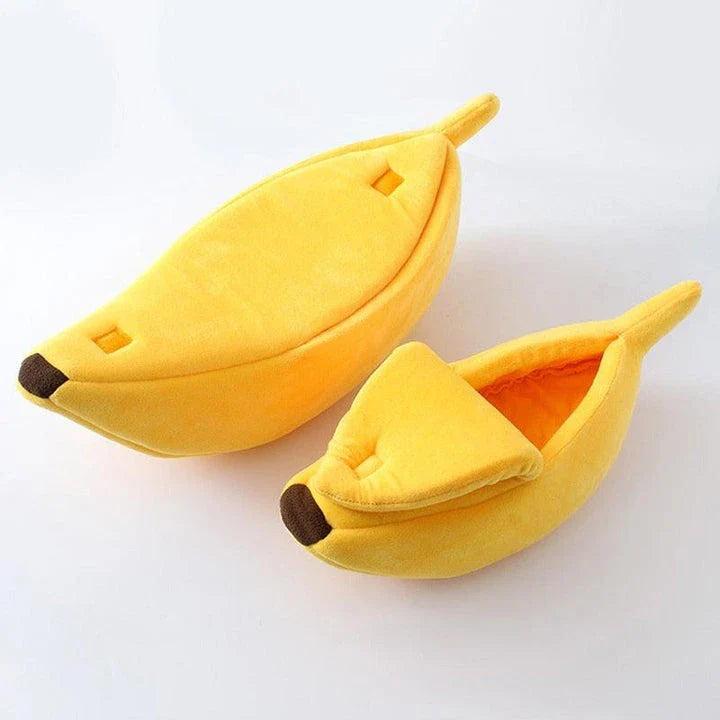 A cosy, banana-shaped cat bed made of plush, supportive materials in various vibrant colours to provide a comfortable and stylish retreat for feline friends.