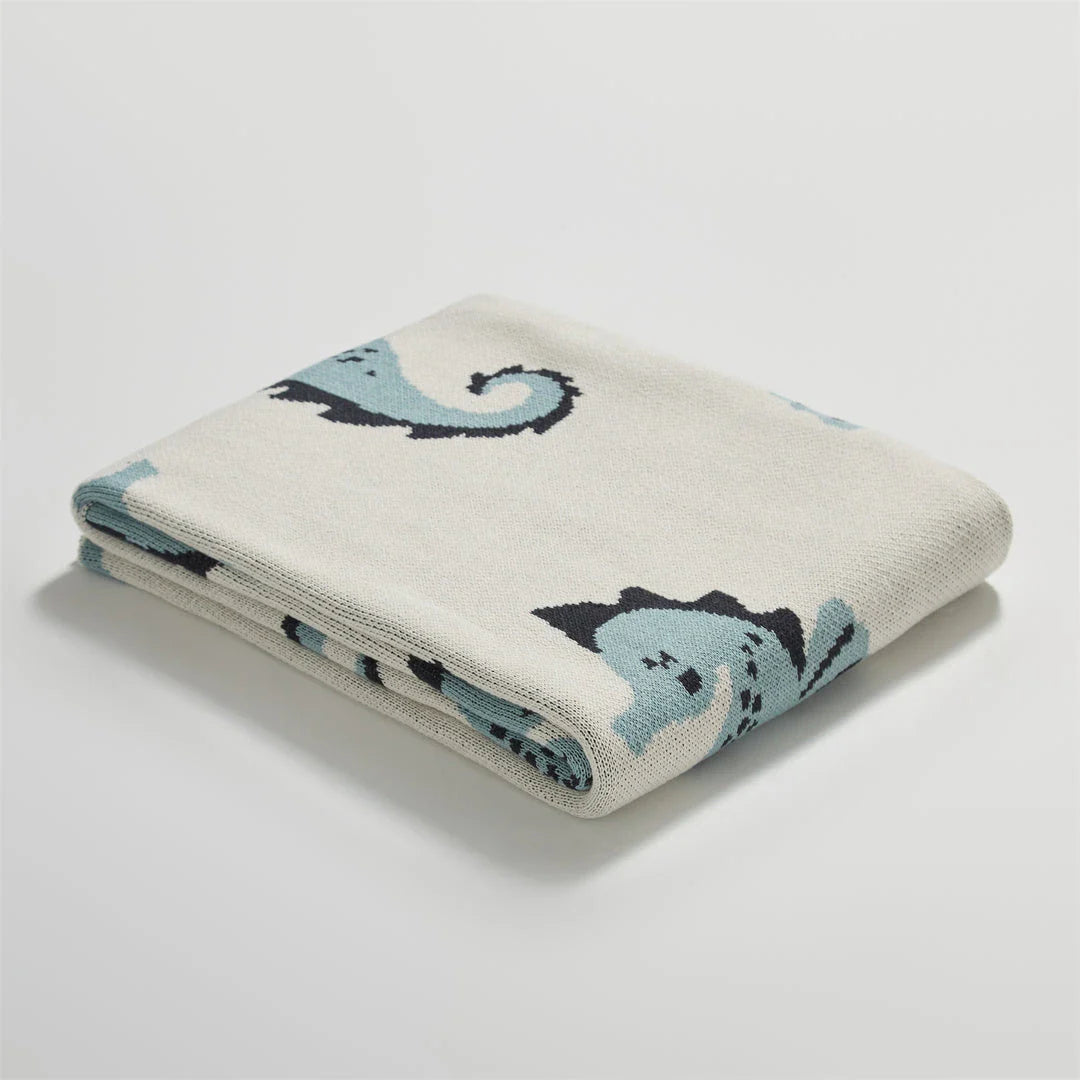 Cosy Sea Horse Cotton Throw Blanket in pink and lake blue colours, featuring a playful sea horse pattern and jacquard weave design.