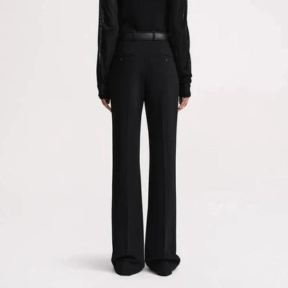Elegant high-waist flared trousers for women in a solid pattern with a flattering fit and subtle pocket details
