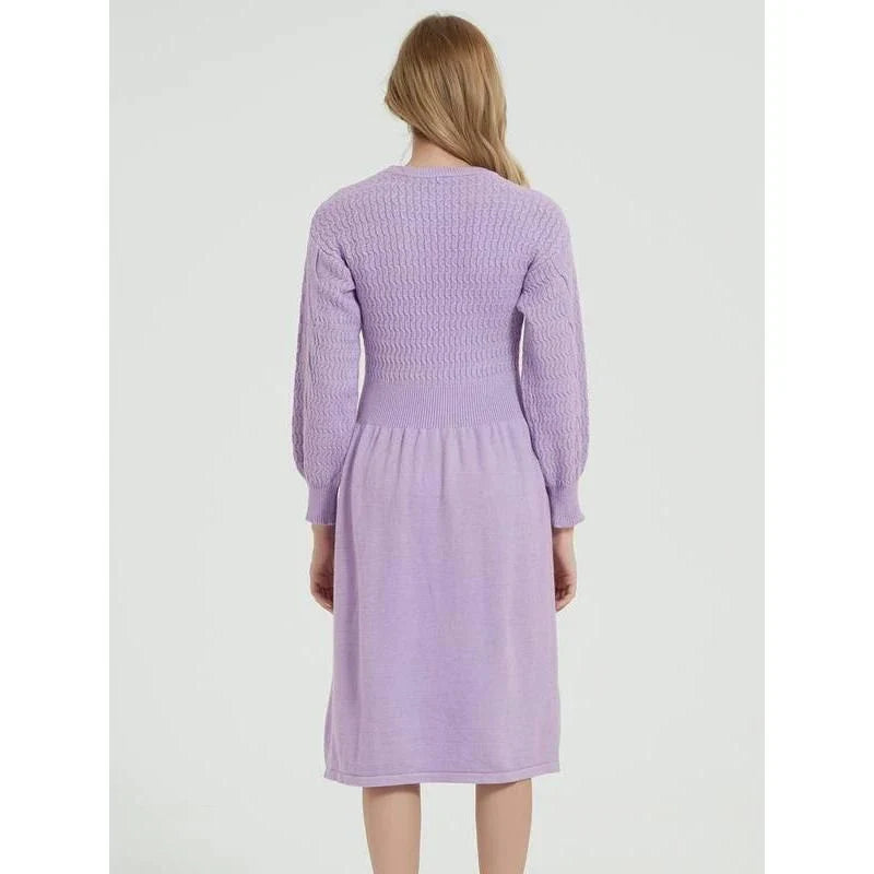 Elegant long sleeve knitted sweater dress in red with a classic A-line silhouette and mid-calf length