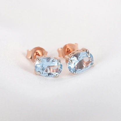 Pair of rose gold-plated sterling silver earrings with a minimalist, geometric design