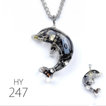 Steampunk-inspired dolphin pendant necklace with electronic components and brass accents
