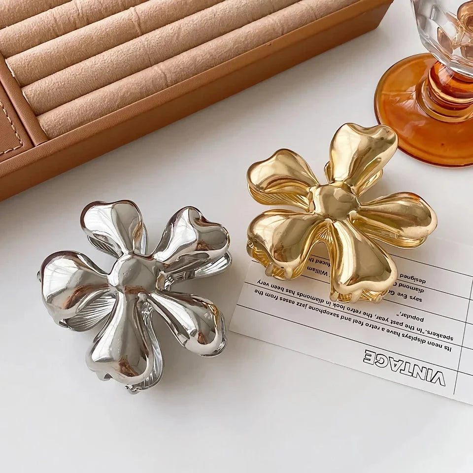 Gold floral metal hair claws - chic hair accessories for women with modern design and natural elegance