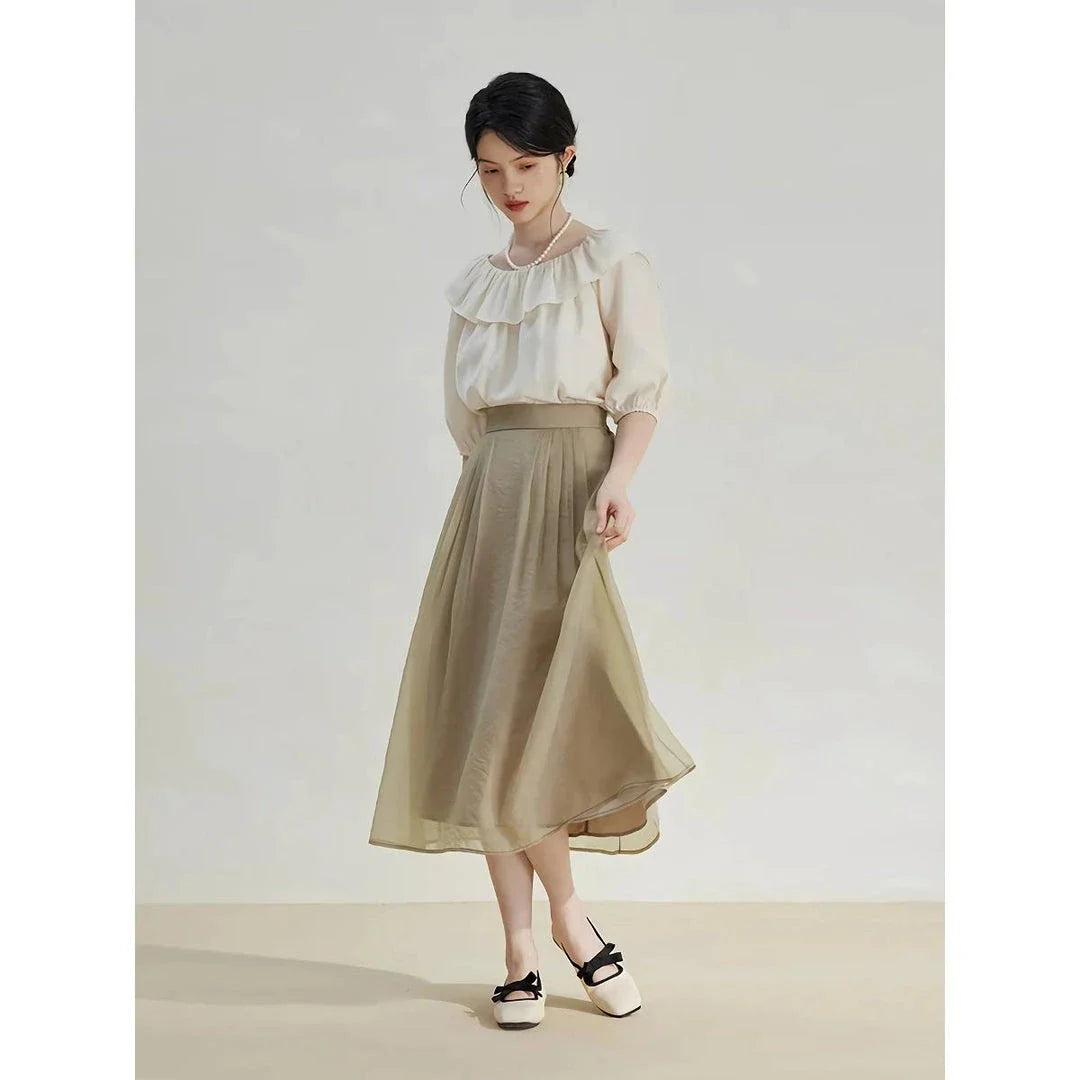 Elegant high-waist a-line midi skirt in a solid, vibrant colour for professional and social wear