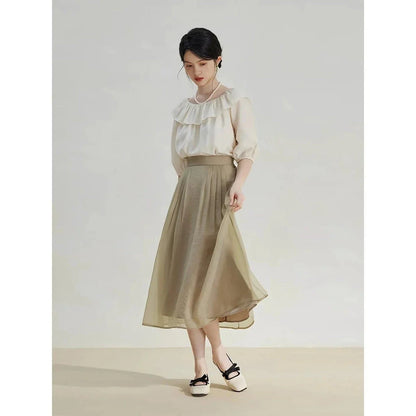 Elegant high-waist a-line midi skirt in a solid, vibrant colour for professional and social wear