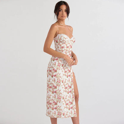 Elegant floral midi dress with slit, adjustable suspender straps, and luxurious polyester fabric for a sophisticated summer look.
