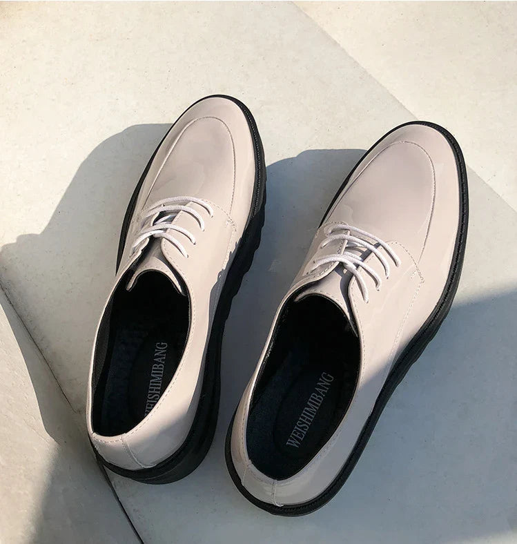 Premium microfiber leather casual shoes with thick rubber sole, low-top design, and striking Korean-inspired details
