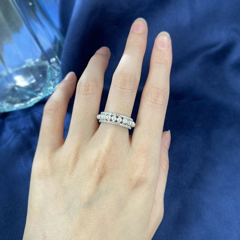 A beautiful 925 sterling silver ring with a delicate pearl accent, designed for the discerning British woman
