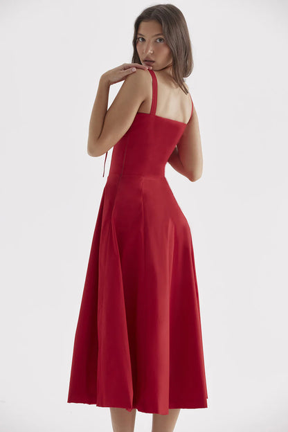 A stylish suspender dress made of premium polyester with a French high-split design, available in a range of vibrant solid colours for versatile summer wear.