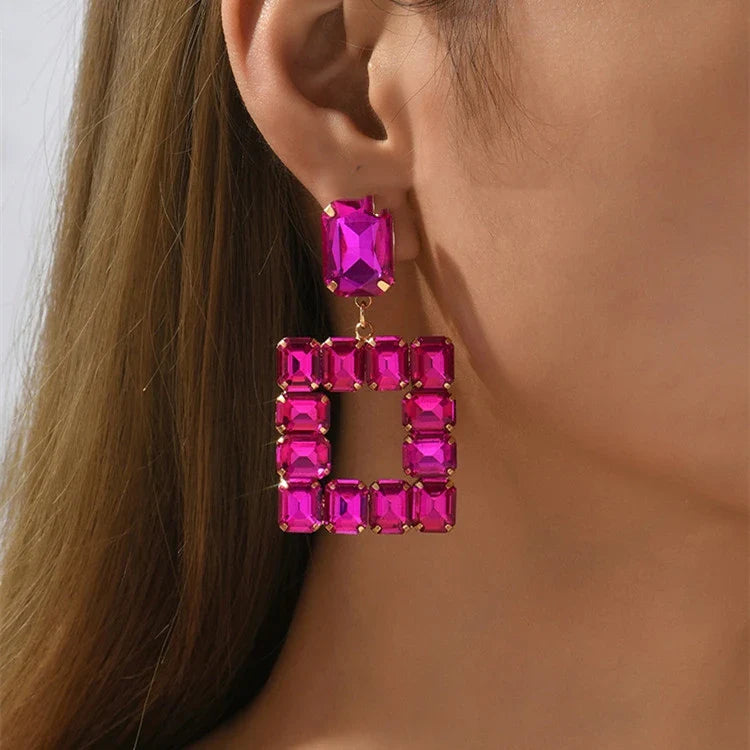 Pair of enchanting crystal earrings made with premium artificial crystals in various colours including rose red, green, pink, champagne, and black