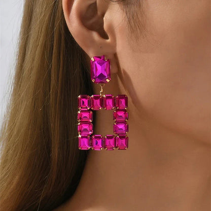 Pair of enchanting crystal earrings made with premium artificial crystals in various colours including rose red, green, pink, champagne, and black