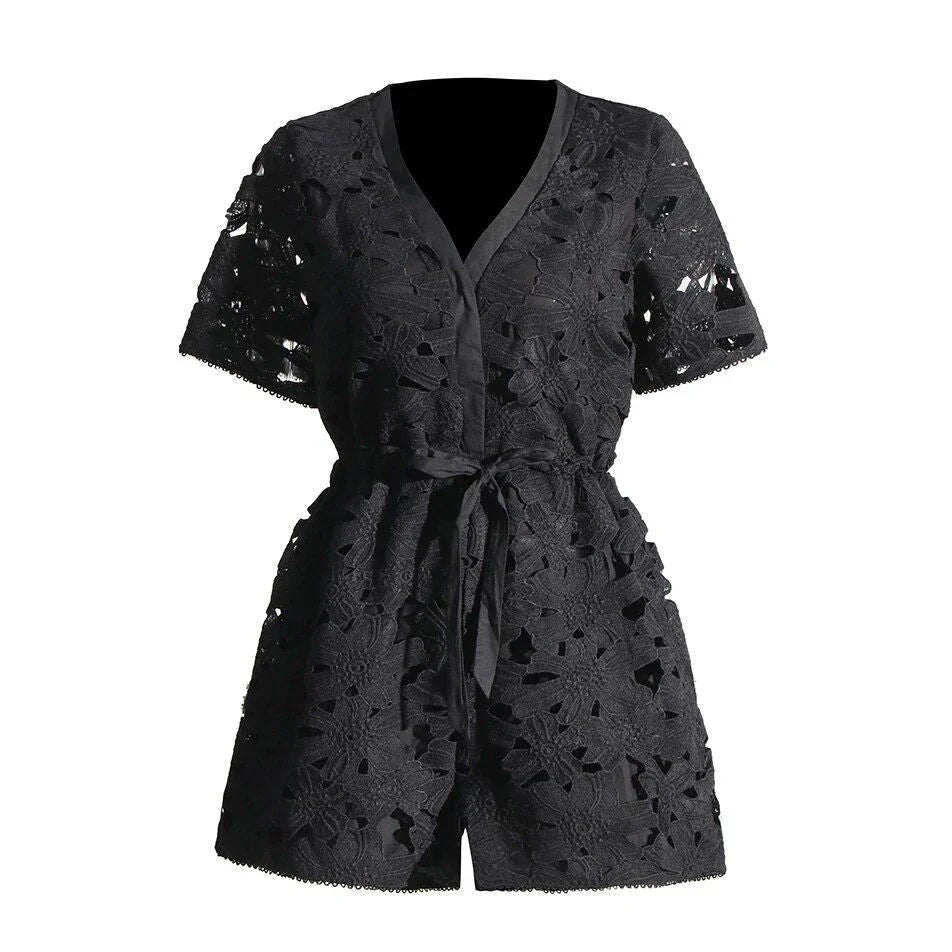 Elegant embroidered playsuit with hollow-out details, perfect for British summer style