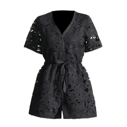 Elegant embroidered playsuit with hollow-out details, perfect for British summer style