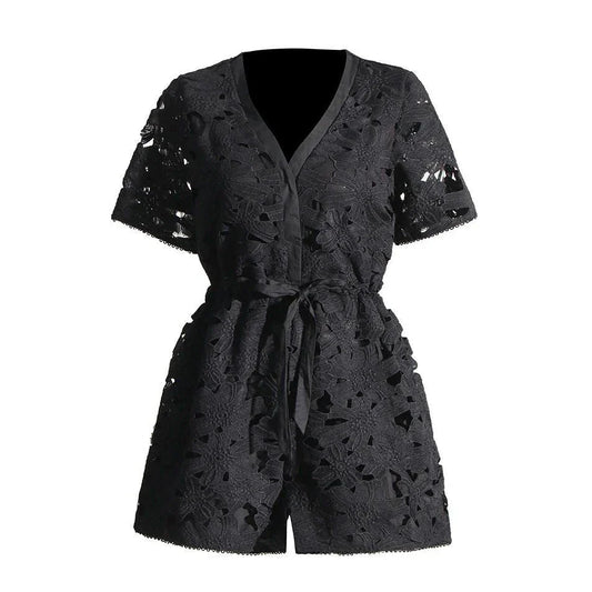 Elegant embroidered playsuit with hollow-out details, perfect for British summer style