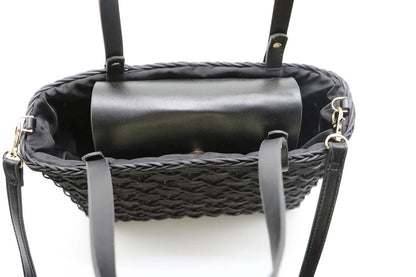 Handwoven rattan handbag in black with a sleek, elegant design for effortless style and practicality