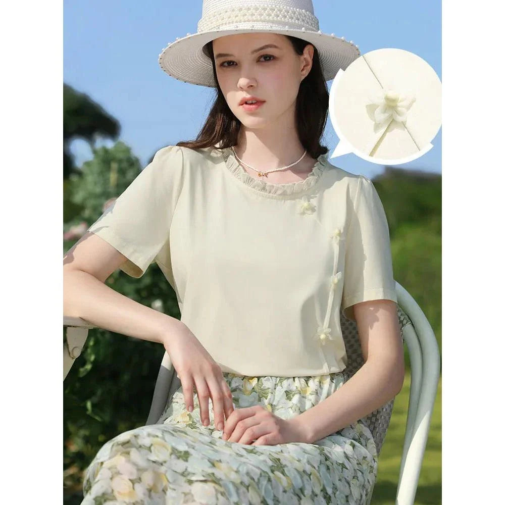 Elegant floral short sleeve t-shirt with wooden ear side detail, perfect for chic British summer style
